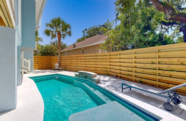 A Moment in Paradise | Luxe house in St. Simons Island with a pool & games