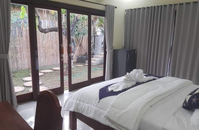 Una nueva casa de 1 dormitorio con cocina abierta con vistas al jardín
