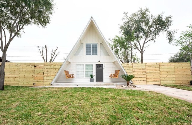 A pet friendly A-Frame with a hot tub & fire pit!