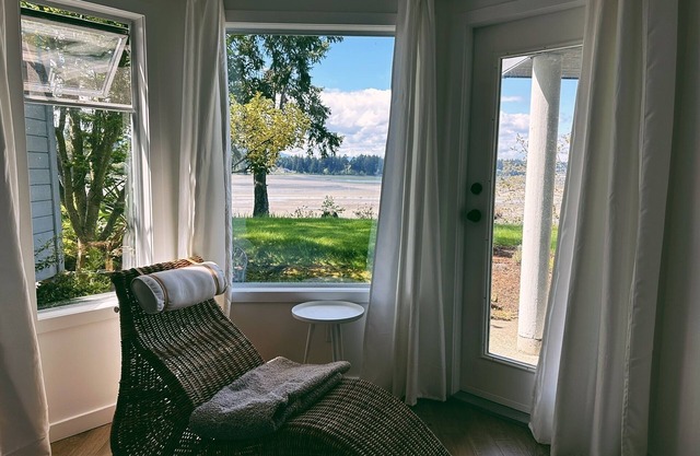 A quiet oceanfront hideaway on the shoreline of Nanoose Bay.