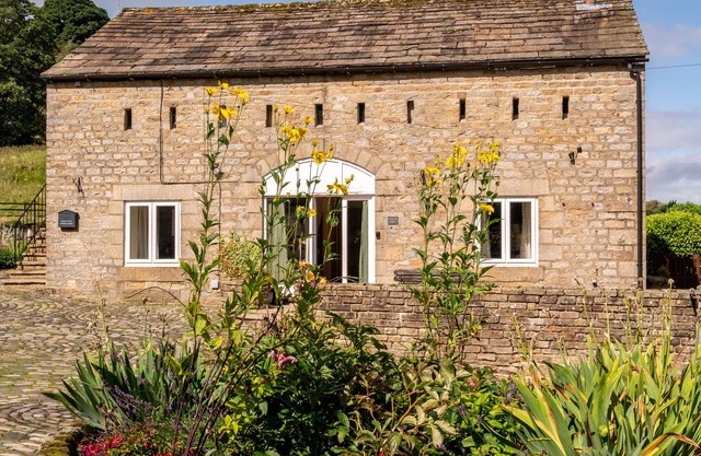 A spacious property with a focus on socialising with far reaching tranquil views of the dales