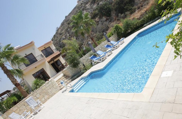 A three-bedroom villa with a private pool and landscaped garden Wi-Fi