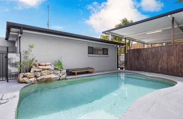 A Tranquil Sunshine Escape with Pool and Deck