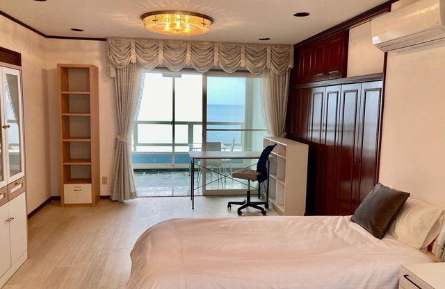 A triple room with a spectacular oceanfront view sunset right in front of you and plenty of amenit / Hamada Shimane