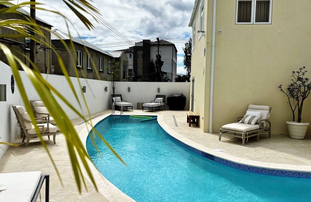 A True Slice of Paradise in Paynes Bay, Newly renovated lower level apartment.
