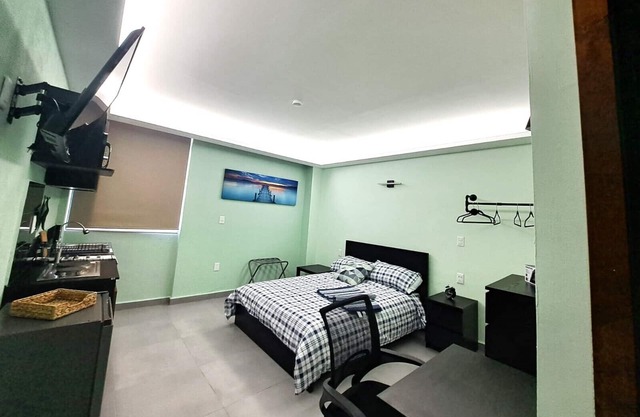 A13 Full Suite Mini Dept at Plaza Acequia A13
