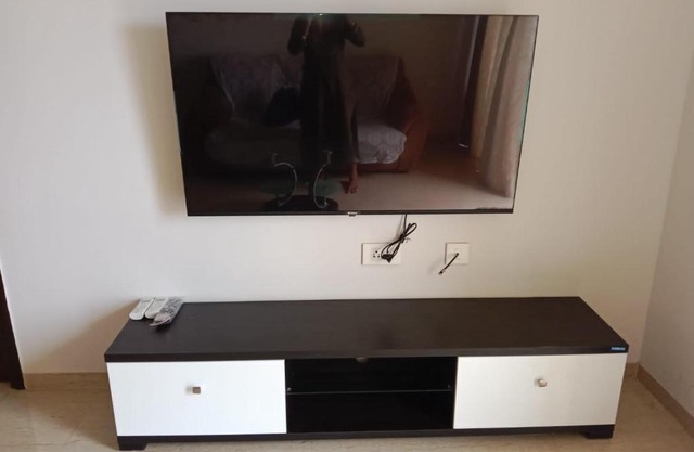 AC 1bhk furnished flat towards highway view in Lodha Belmondo, Pune