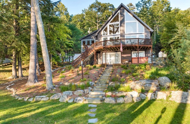 Adirondack style Winnipesaukee waterfront home with 4 bedrooms and SW EXP
