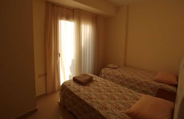Aegean Pearl Suites 3 + 1 frente a la piscina, frente a la playa
