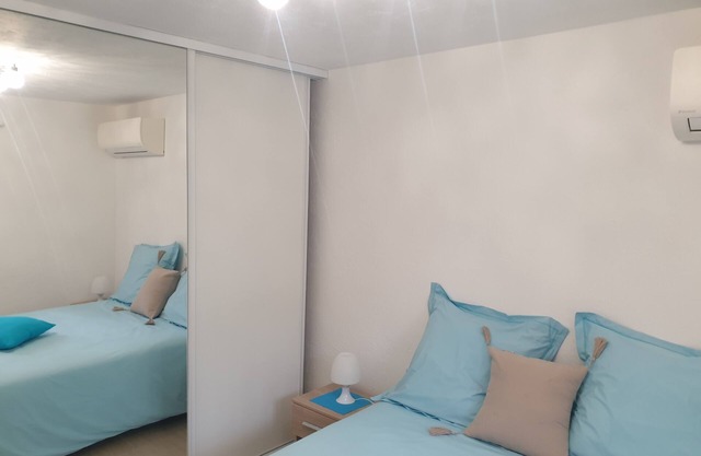 Air-conditioned and a 5-minute walk from the beach.