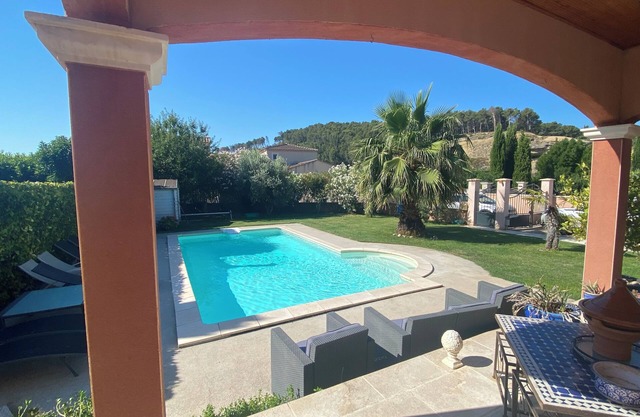 Air-conditioned room in spacious villa with swimming pool