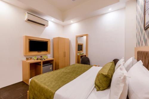 Airport Hotel Tashree Near Yashobhoomi - Free Airport Drop