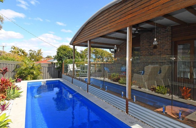 All Decked Out - Spacious split-level family or fishing retreat with pool, WIFI and room for the boa