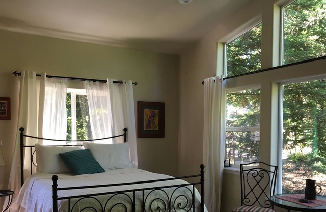 All Inn Guesthouse Big windows, vaulted ceilings, Very private park like setting