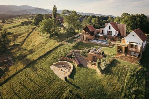 Am Wildbachberg - Luxus Ferienhäuser mit Infinitypool, Privatsauna und Weinkeller