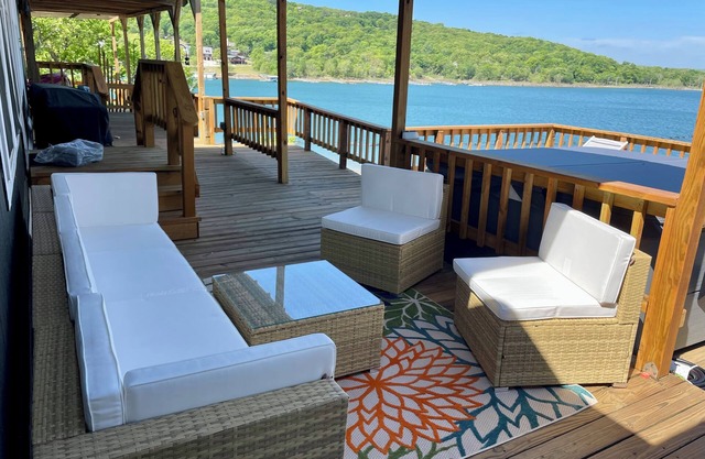 AMAZING WATERFRONT HOME WITH HOT TUB. BOTH HAVE EXTENSIVE VIEWS OF THE LAKE