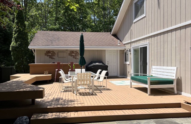 Amazing Westhampton home with all amenities--pool, hot tub, tennis court, deck.