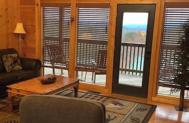American Spirit is a charming two-bedroom cabin located in Hidden Springs Resort
