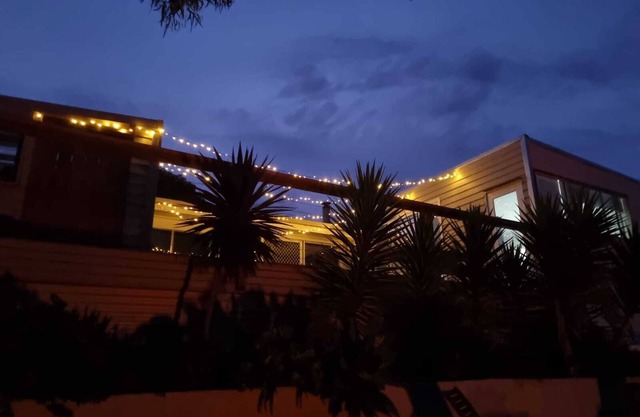 An entertainer's paradise featuring deck and bar. Relaxed Home, Amazing Views.
