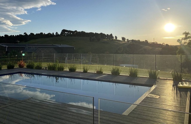 An idyllic 6 bedroom, north facing property set on 5 acres, rolling hill views.