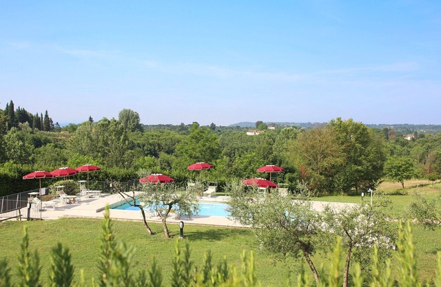 ¡Apartamento perfecto para familias en casas de vacaciones con piscina, parque, wifi y hamacas!