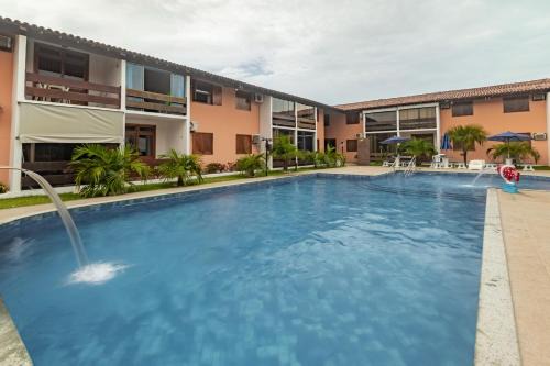 Apart-hotel a 400m da Praia de Taperapuan