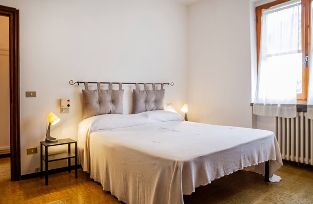 Apartamento 'Villa Rodolfo' con terraza privada, jardín privado y aire acondicionado.