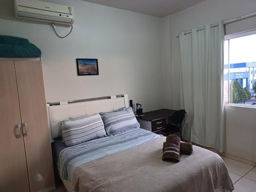 Apart próximo a Unimed de 2 quartos com AR, mini-Academia e garagem no Centro-sul