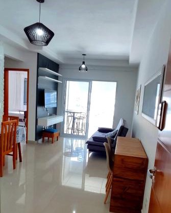 Apartamento na Praia das Toninhas em Ubatuba 350m da praia -2 quartos sendo 1 suite, piscina, varanda gourmet com churrasqueira, ar condicionado, cozinha completa, duas garagens