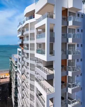 Apartamento NOvo na Praia do Morro Temporada Wi-Fi, Vista Mar, garagem, varanda grande