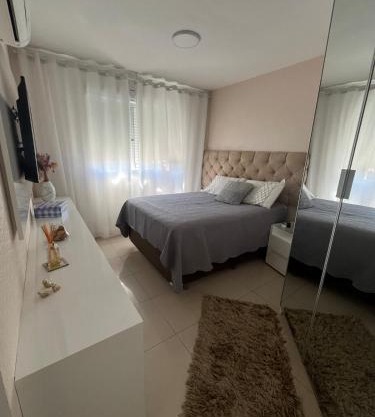 Apartamento suíte com estacionamento