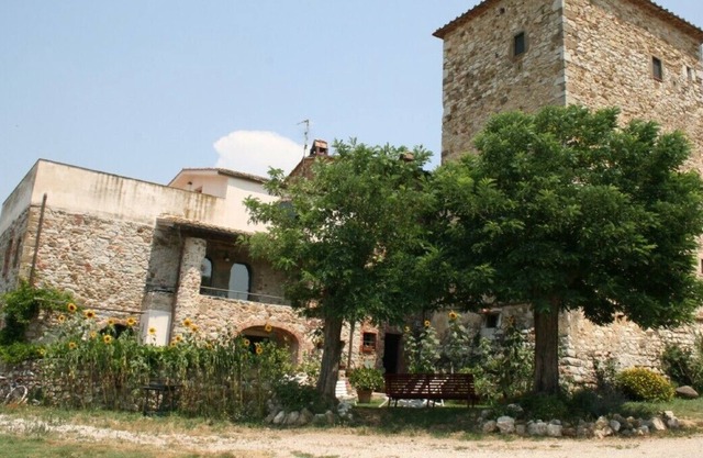 Apartamento con jardín en una antigua granja del siglo XI.