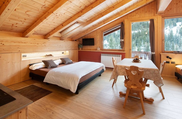 Apartamento 'Chalet Primula 13' con vistas a la montaña, jardín compartido y Wi-Fi