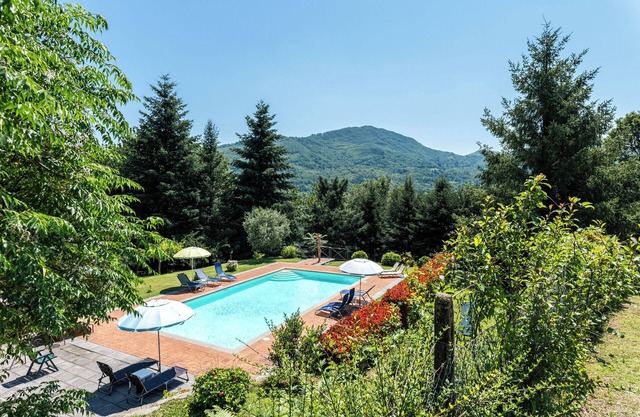 Apartamento 'Alba al Rifugio Arcobaleno' con vistas a la montaña, piscina compartida y Wi-Fi