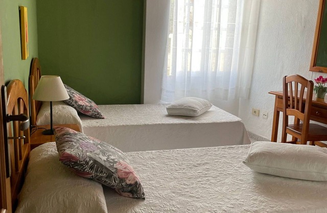 Apartamento 'Apartamento 1' con piscina compartida, terraza privada y Wi-Fi