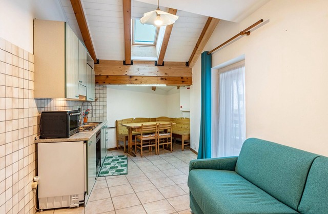 Apartamento 'Appartamento Condominio Genziana' con vistas a la montaña, balcón y Wi-Fi