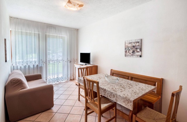Apartamento 'Appartamento Bilocale 2' con vistas a la montaña, jardín compartido y Wi-Fi