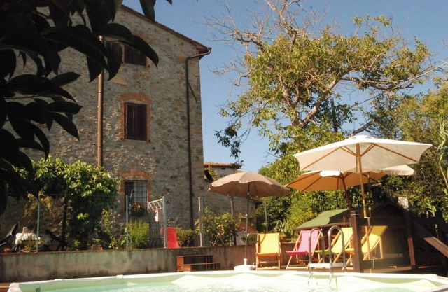 Apartamento 'Appartamento Mansarda' con piscina compartida, Wi-Fi y aire acondicionado
