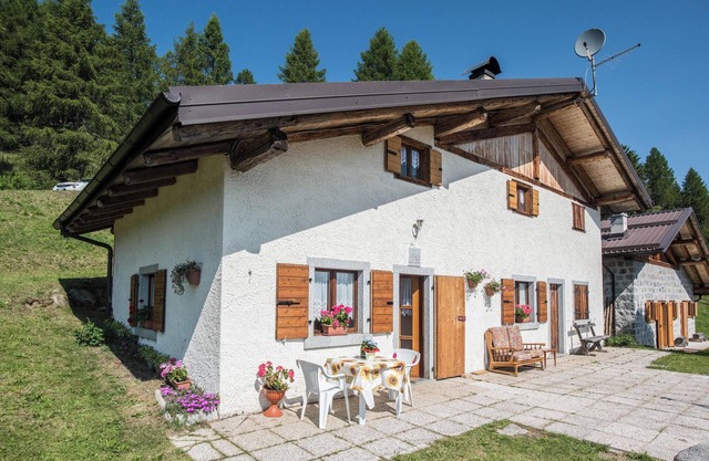 Apartamento "Baita Località Cap" con jardín y vistas a la montaña