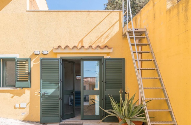 Apartamento 'Barrabisa Bilocale Grazioso' con terraza privada y aire acondicionado