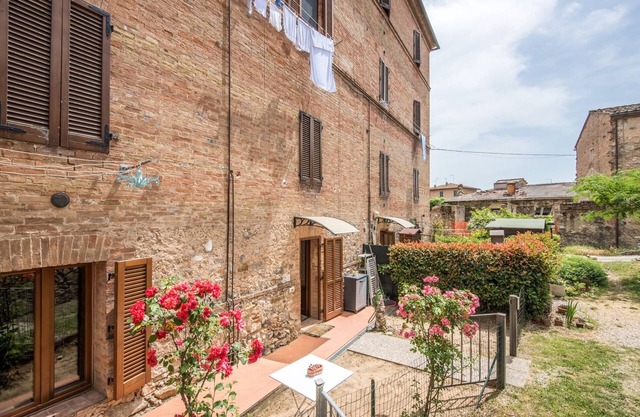 Apartamento 'Borgo Rosia 85' con jardín a pocos pasos de Siena