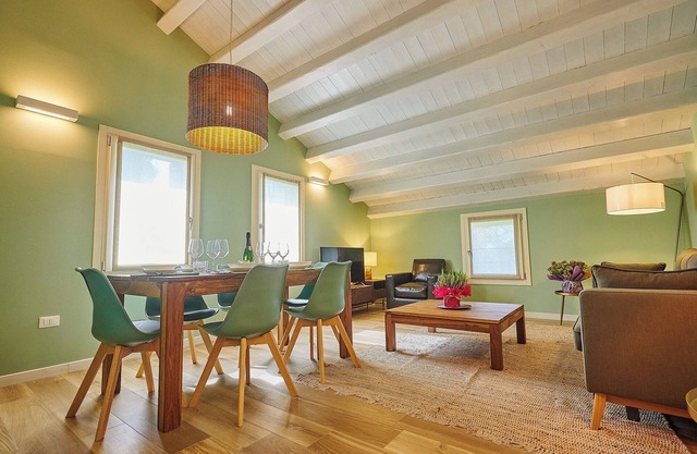 Apartamento 'Ca' Marano Green' con piscina compartida, Wi-Fi y aire acondicionado