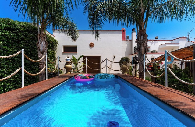 Apartamento 'Casa Aurora Luxury' con piscina compartida, Wi-Fi y aire acondicionado
