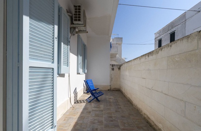 Apartamento 'Casa Degli Oleandri ' con terraza privada y aire acondicionado