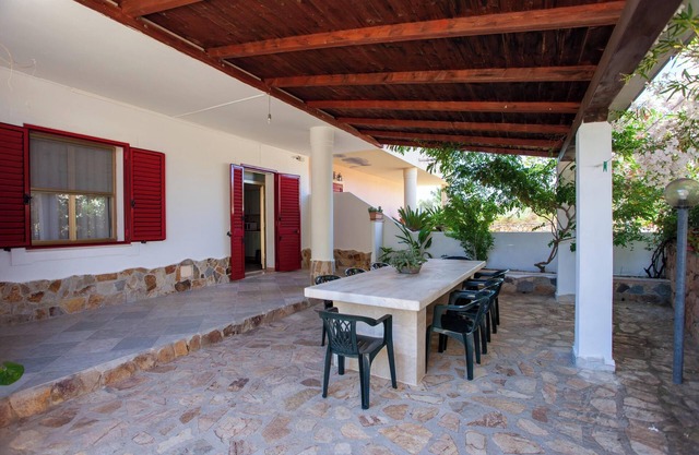 Apartamento Casa delle Mimose cerca de la playa con A/C, Wi-Fi, jardín, terraza y barbacoa