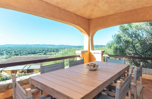 Apartamento 'Casa Lauretta' con vistas al mar, piscina compartida y aire acondicionado