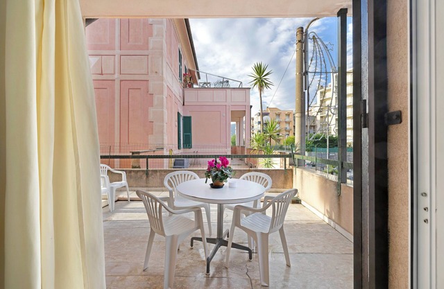 Apartamento 'Casa Rosa' con terraza privada y Wi-Fi