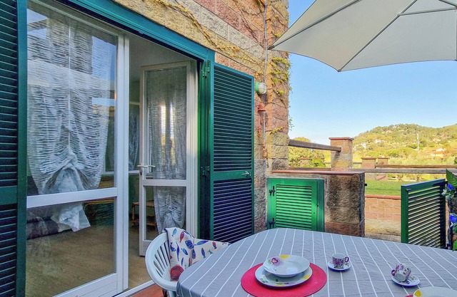 Apartamento 'Casa Sant' Anna' con piscina compartida, terraza privada y Wi-Fi