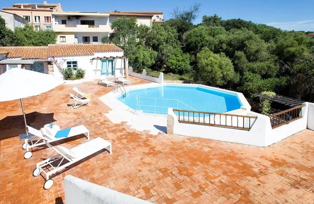 Apartamento "Casa con encanto en San Pantaleo" con piscina compartida, aire acondicionado y terraza