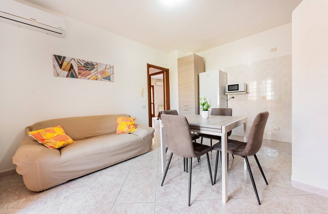 Apartamento 'Colombo Rooms' con balcón y aire acondicionado